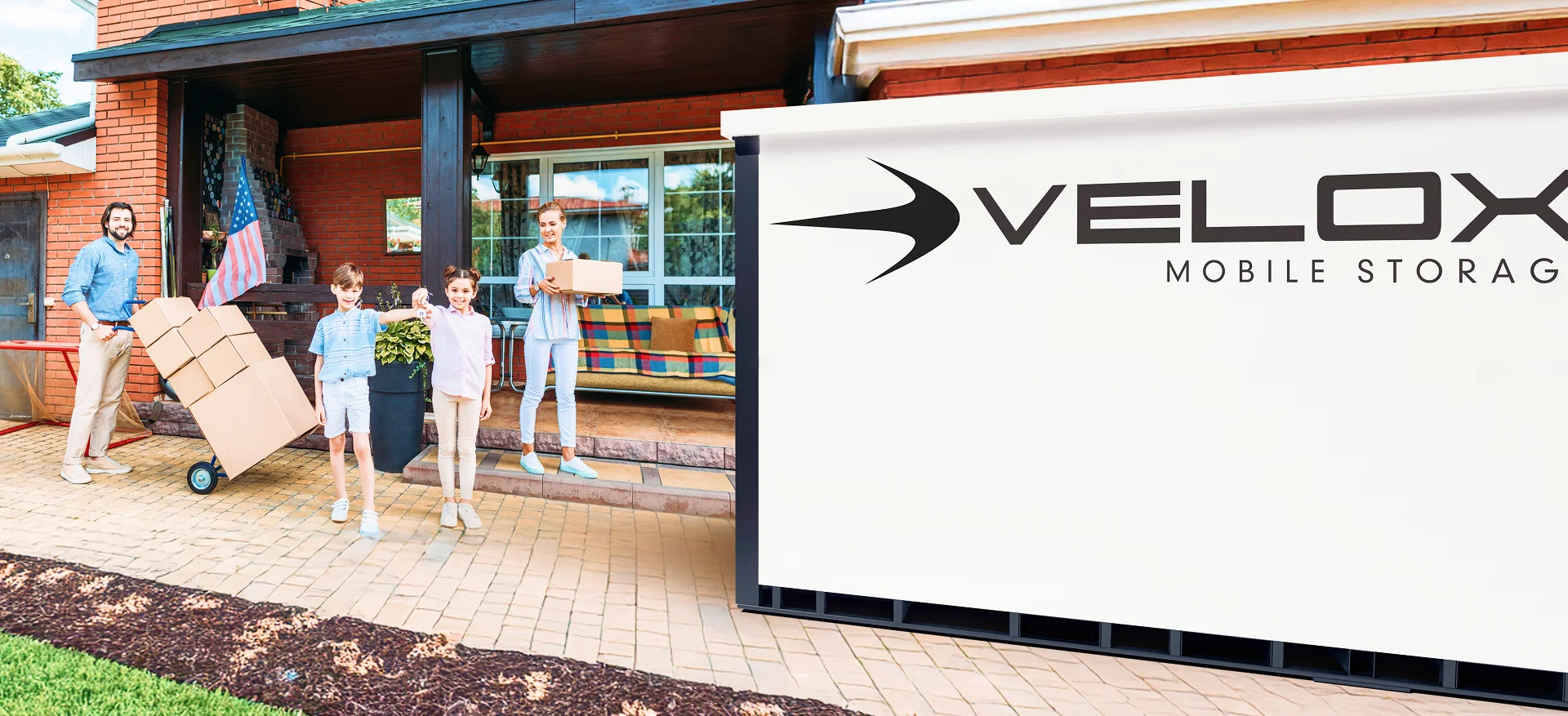 family packing and moving with Velox storage container at home
