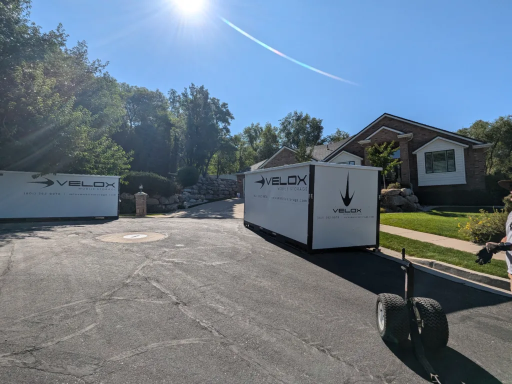 A Velox Mobile Storage container placed in a residential driveway